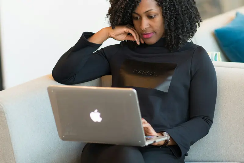 A woman working on a laptop