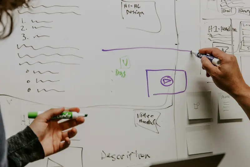 Sketching a system diagram on a whiteboard